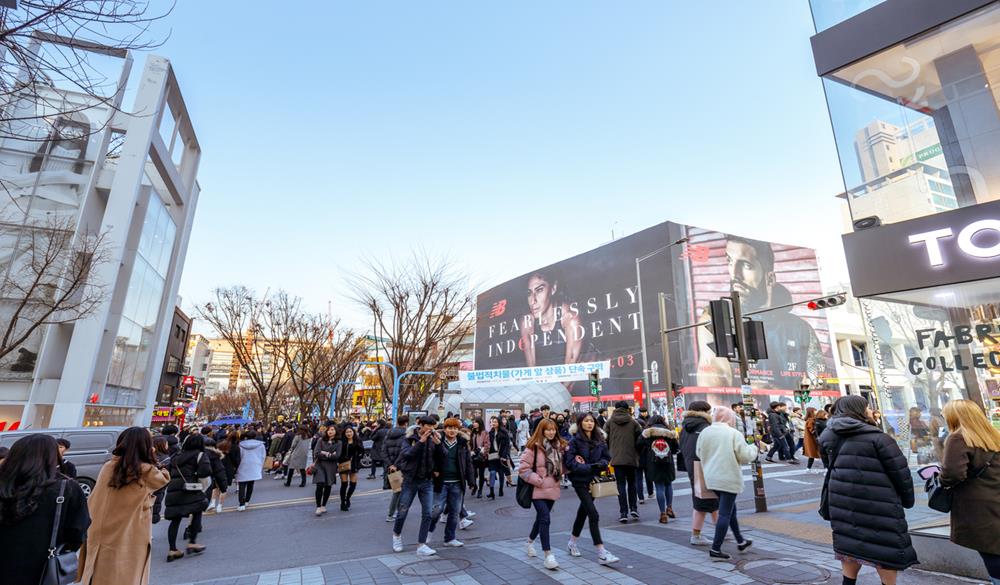 Seoul, South Korea - March 2, 2018 : Local shops - lined at Hongdae (Hongik University) shopping street. Hongdae is a shopping cultural street for young people in Seoul.